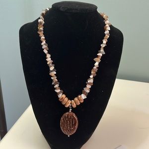 N35. Brown and white stone and glass necklace.